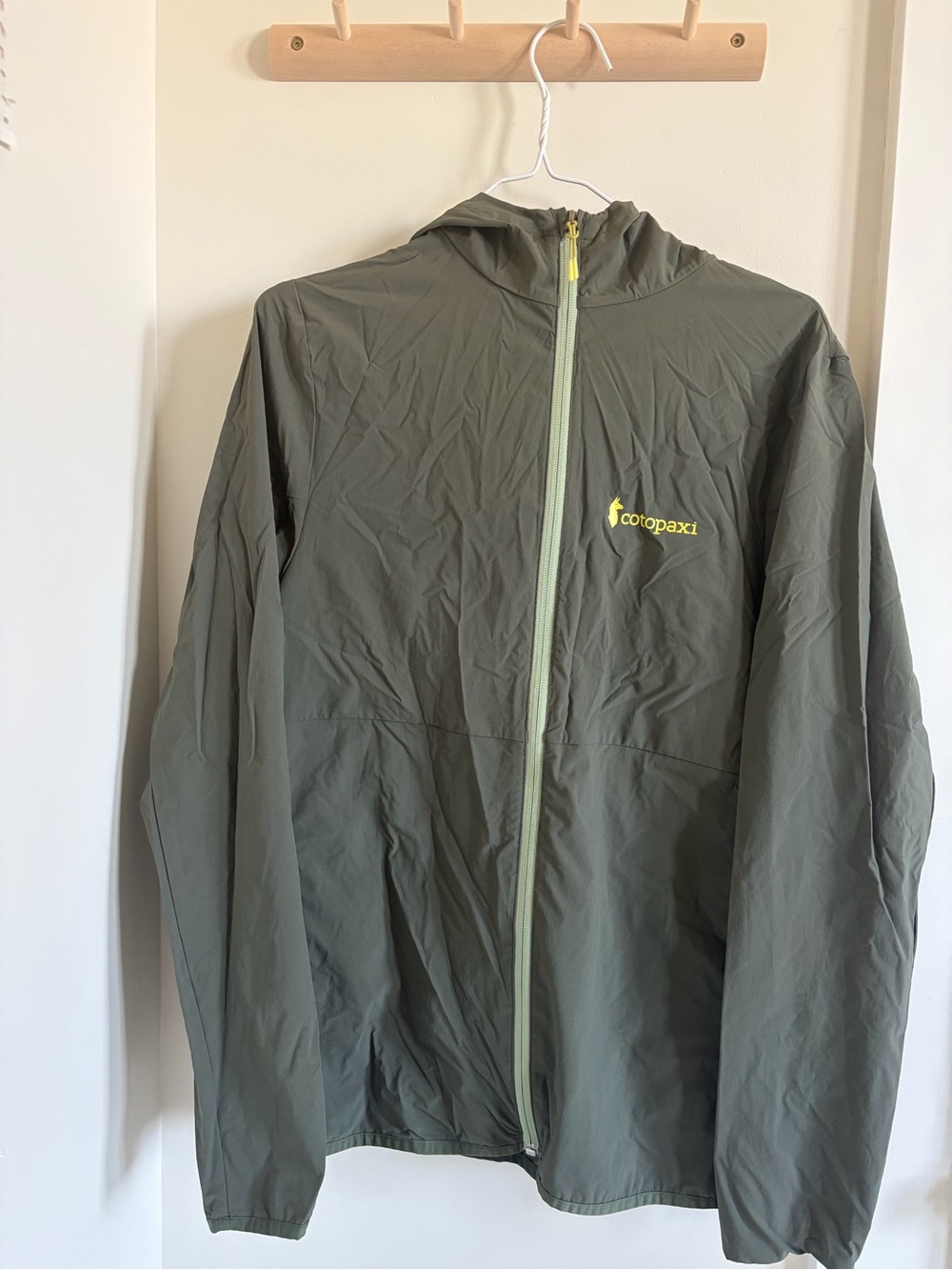 cotopaxi Olive Green Hooded Windbreaker with Yellow Logo